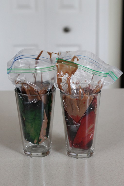 Not the prettiest picture, but this is my method for coloring the batter. The bowl or glass keeps the bag upright so it is easier to fill.