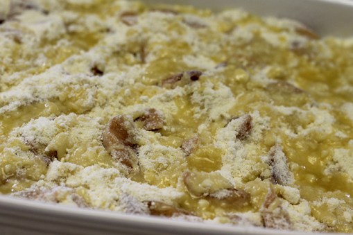 This is what it will look like when you layer fruit, cake mix and melted margarine in prepared pan.